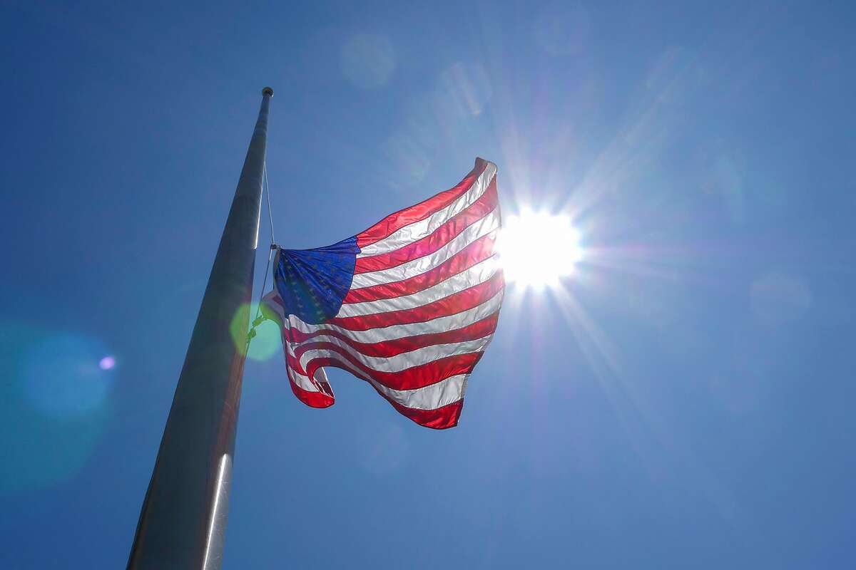 The flag flies at half-staff, Thursday August 8, 2019, in San Rafael, Ca. The city’s mayor Gary Phillips orders all of the flags in the city to fly at half-staff until Congress acts on gun control.