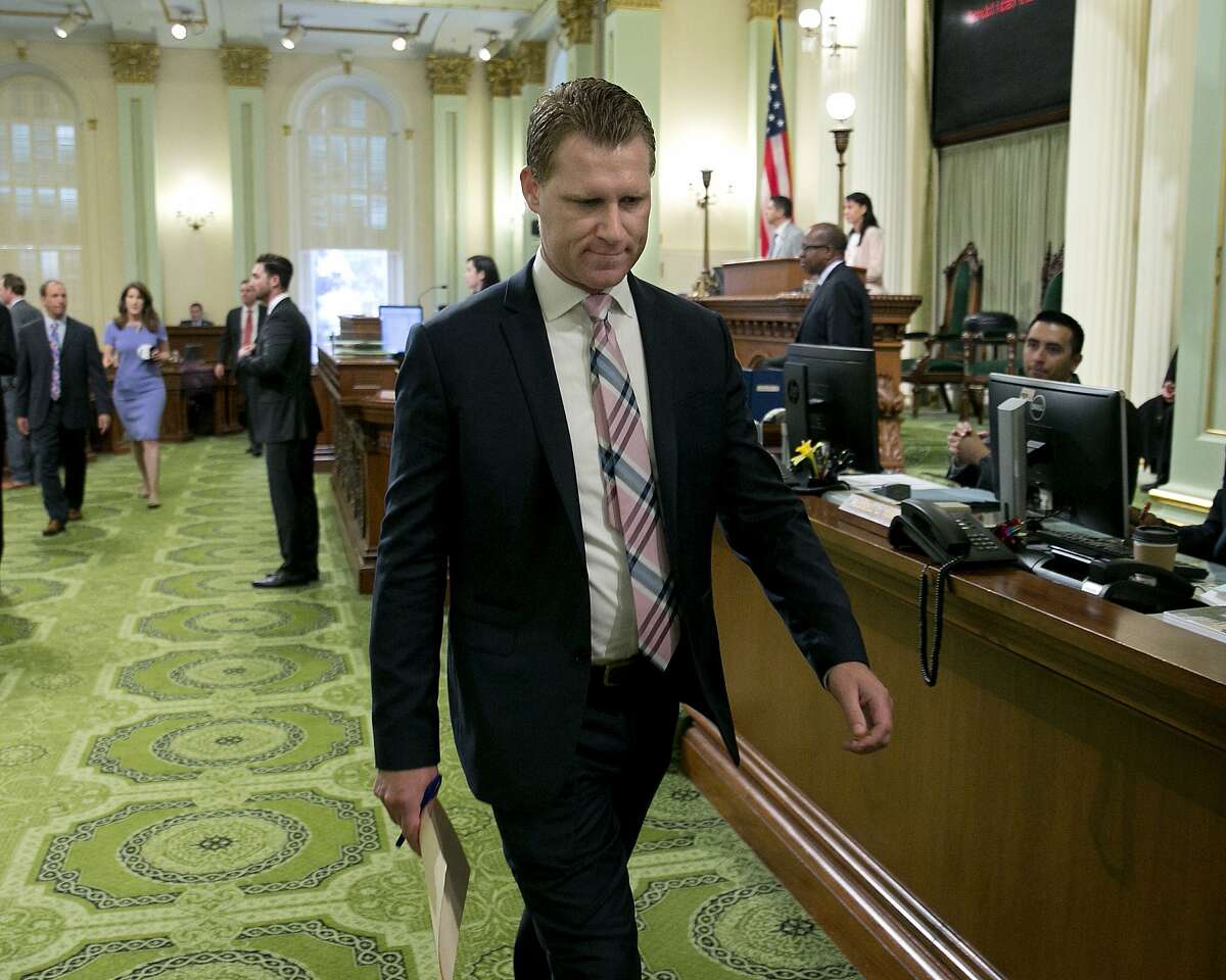 Assembly Republican Leader Chad Mayes, of Yucca Valley, leaves the Assembly floor to attend a GOP caucus meeting where he resigned as Assembly GOP Leader, Thursday, Aug. 24, 2017, in Sacramento, Calif. Mayes wants the California Republican Party to do more to denounce white nationalism and racism. Mayes, R-Yucca Valley (San Bernardino County), said in a tweet this week that he will propose a formal resolution at the party�s next state convention this fall. �Republicans must reject racism, xenophobia, nationalism, and white supremacy. The belief that one group of people is superior to another is fundamentally un-American,� Mayes tweeted, with the hashtag #epluribusunum.