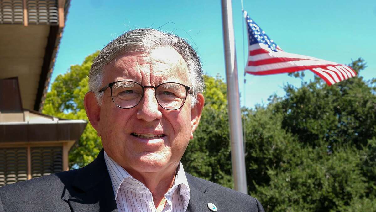 San Rafael's mayor, Gary Phillips, stands outside City Hall where the flag is flying half-staff on Aug. 8, 2019. Phillips has promised to fly the flag at half-mast until Congress acts on gun control.