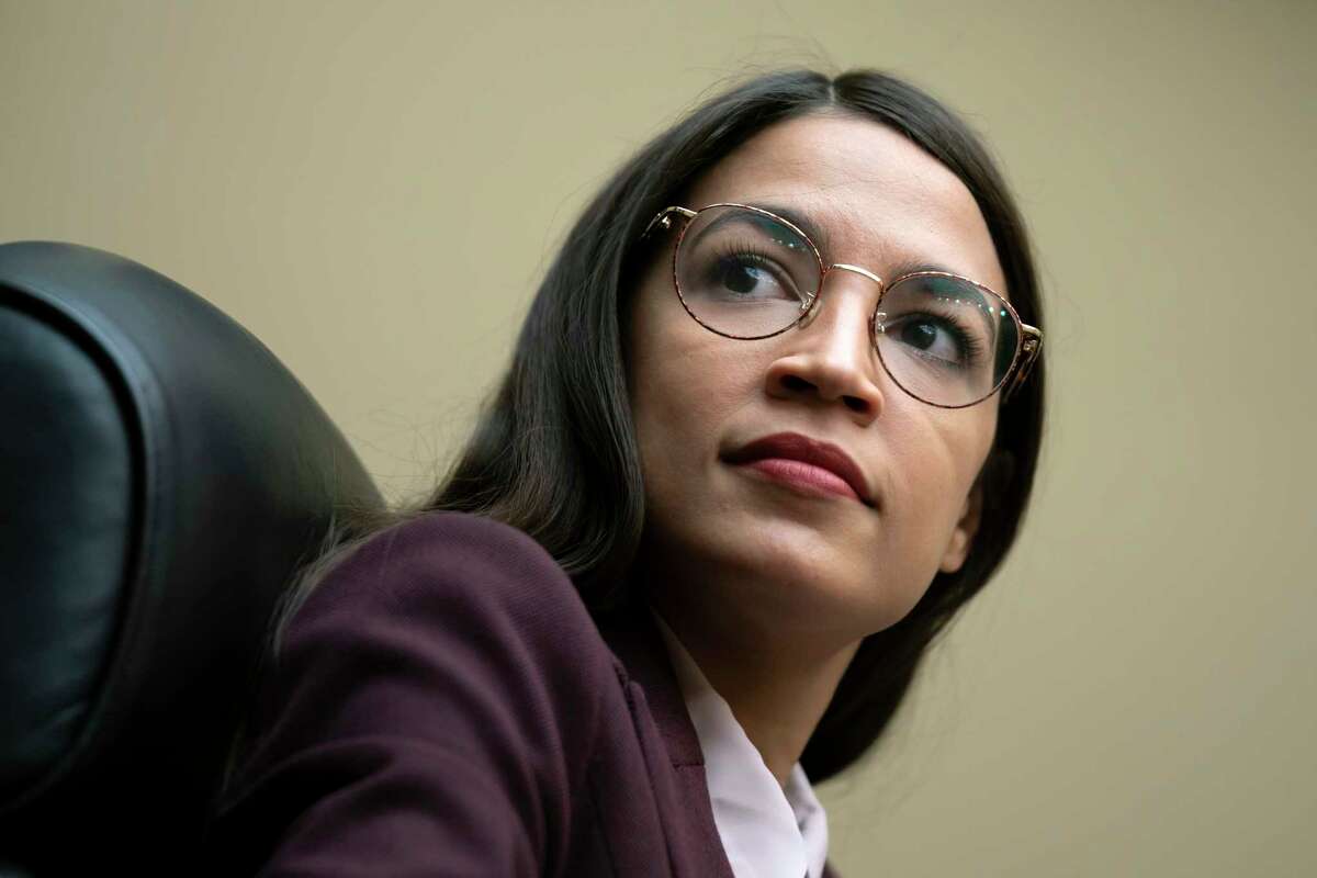 FILE - In this July 26, 2019 file photo, Rep. Alexandria Ocasio-Cortez, D-N.Y., attends a House Oversight Committee hearing on Capitol Hill in Washington. (AP Photo/J. Scott Applewhite)
