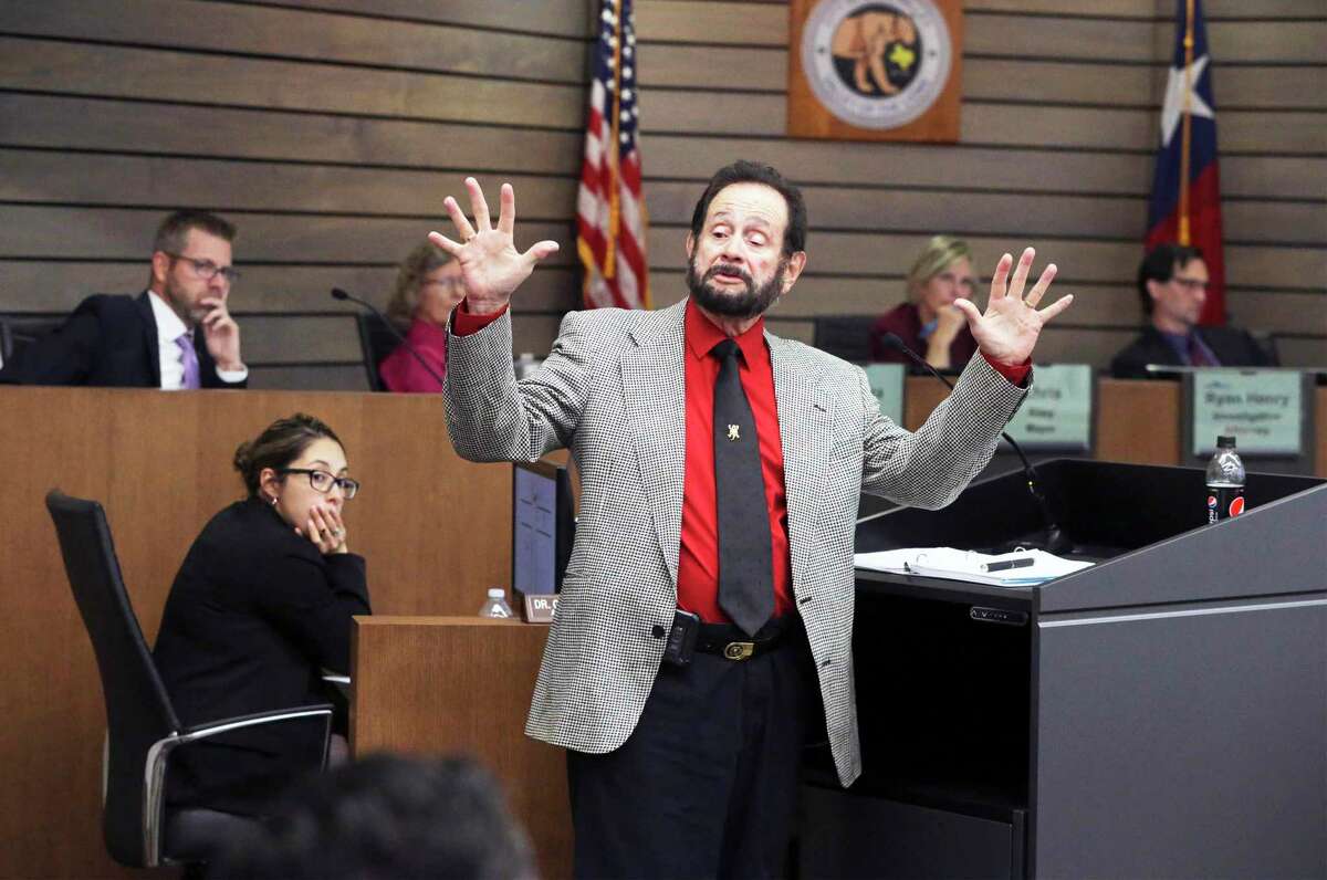 Leon Valley City Council member Benny Martinez provides rebuttal during his 2019 forfeiture hearing. Martinez was removed from office by a 2-1 council vote through a process provided in the suburban city’s charter. Council member Will Bradshaw (left background) now faces a similar hearing.