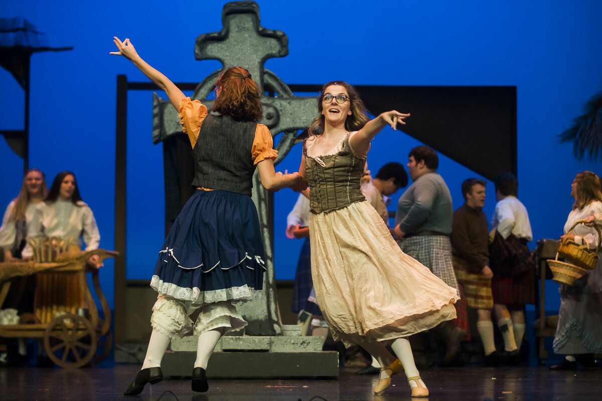 Actors act out a scene during a dress rehearsal for Teenage Musicals Inc.'s production of "Brigadoon" on Thursday, Aug. 8, 2019 at the Midland Center for the Arts. (Katy Kildee/kkildee@mdn.net)