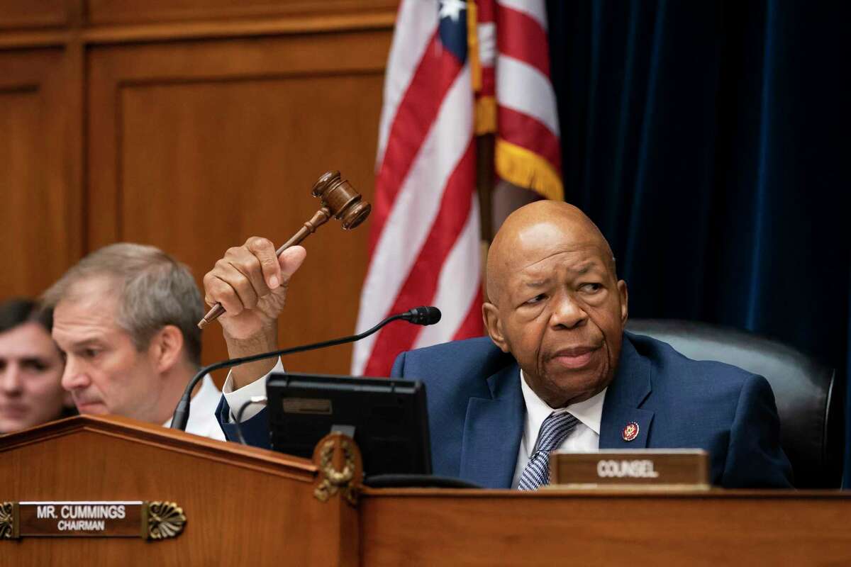 House Oversight and Reform Committee Chairman Elijah E. Cummings, D-Md., joined at left by Rep. Jim Jordan, R-Ohio, the ranking member, considers whether to hold Attorney General William Barr and Commerce Secretary Wilbur Ross in contempt for failing to turn over subpoenaed documents related to the Trump administration's decision to add a citizenship question to the 2020 census, on Capitol Hill in Washington, Wednesday, June 12, 2019. (AP Photo/J. Scott Applewhite)