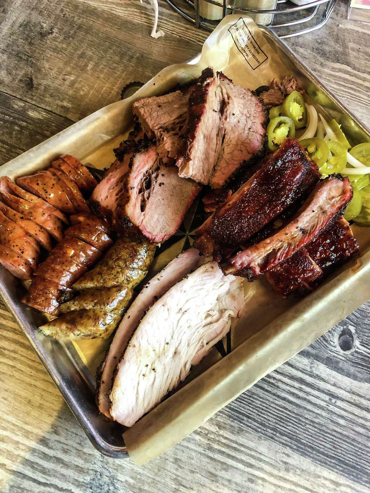 Barbecue tray with sliced turkey breast at Pappa Charlies Barbeque at Cypress Trail Hideout