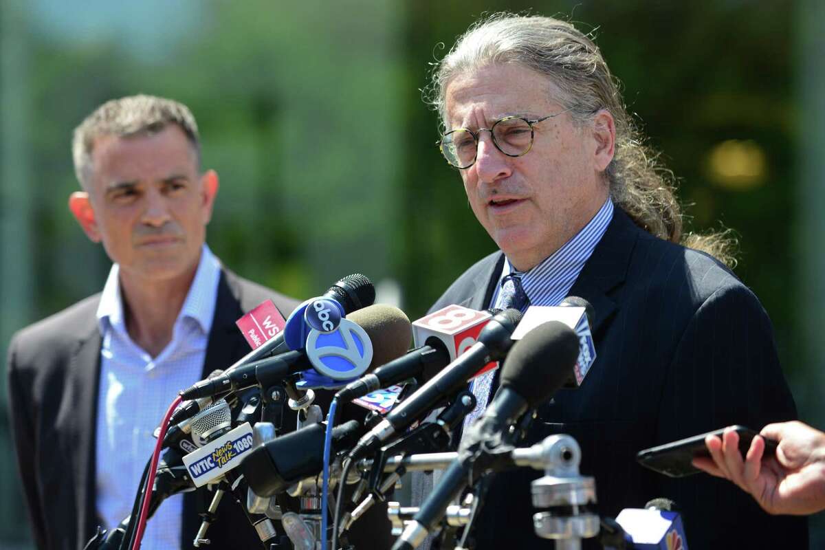 Fotis Dulos, charged with tampering with evidence and hindering prosecution in connection with his wife’s disappearance, exits state Superior Court in Stamford with his attorney Norm Pattis, right, who speaks to the press Aug. 9.