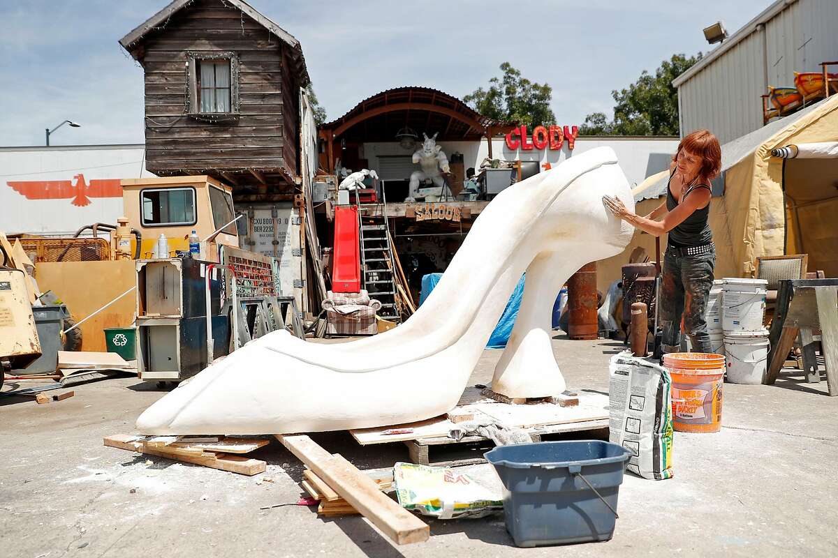 Artist Clody Cates works on a sculpture at NIMBY Collective warehouse in Oakland, Calif., on Monday, August 5, 2019.