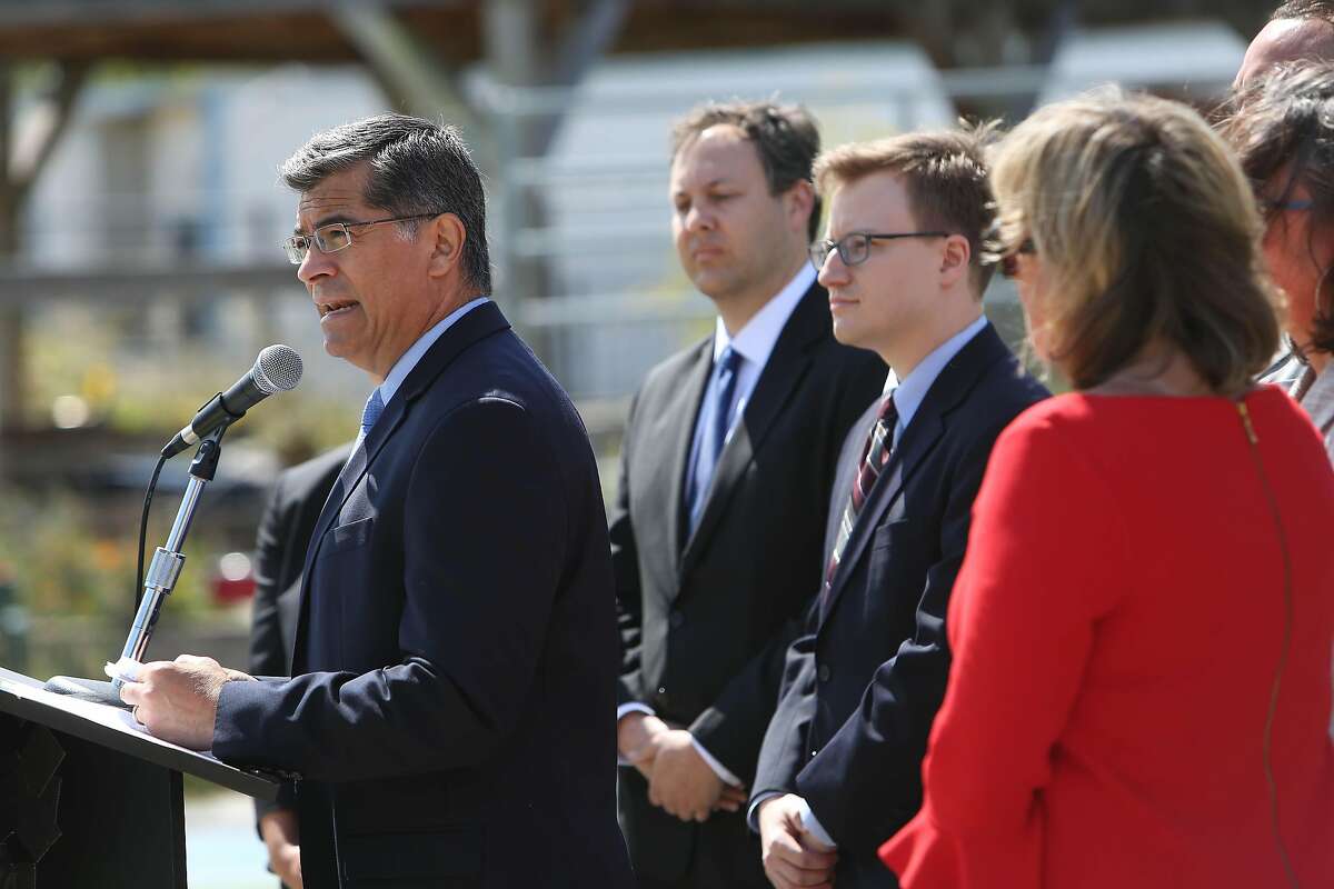 California attorney general Xavier Becerra (left) speaks during a press conference at Bayside Martin Luther King, Jr. Academy, on Friday, August 9, 2019 in Sausalito.