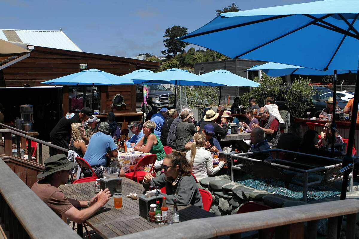 Diners crowd the patio at Princess Seafood Market & Deli, which sells local fish and seafood alongside Noyo Harbor in Fort Bragg. The city of Fort Bragg, named after Confederate Gen. Braxton Bragg, will consider changing its name.