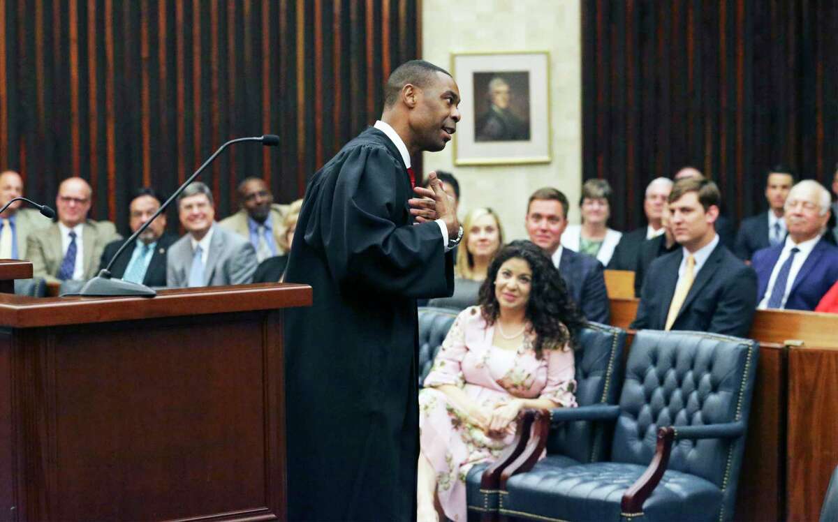Jason Pulliam offers his outlook after he is sworn in as the newest federal judge by Chief U.S. District Judge Orlando Garcia at the John H. Wood Federal Courthouse on August 9, 2019.