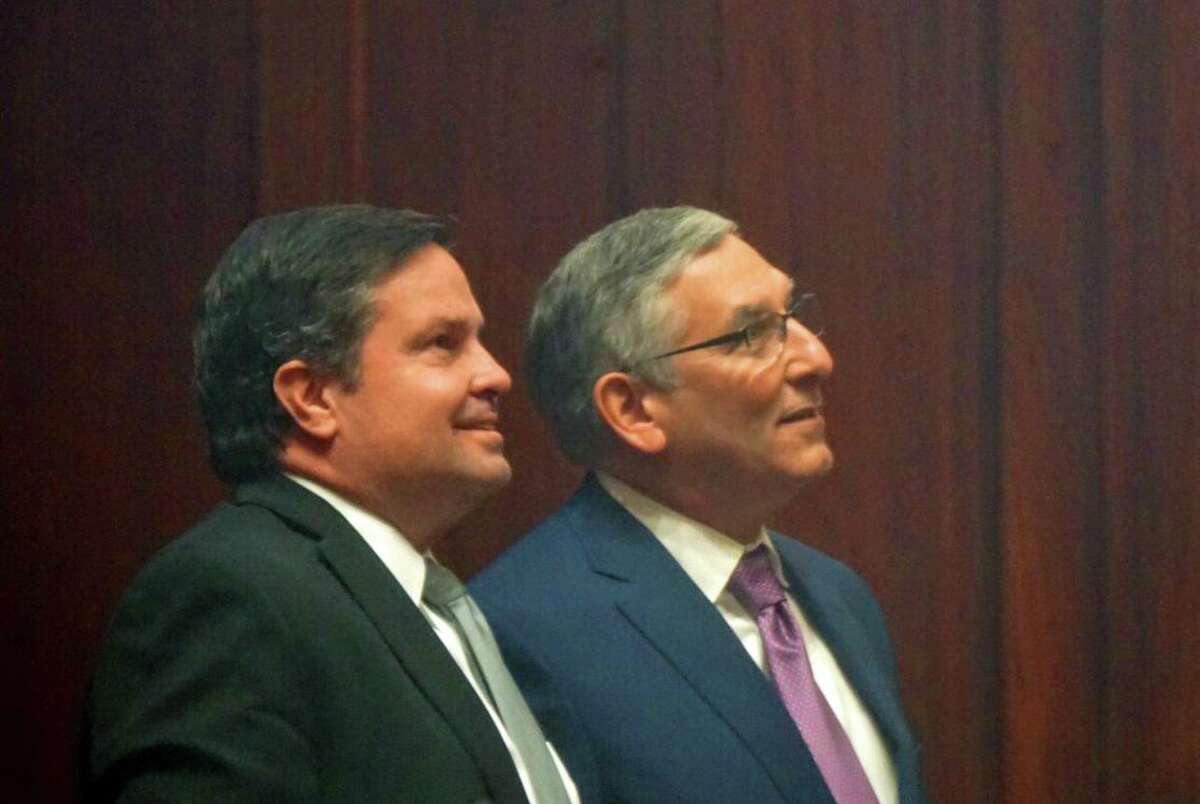 Senate Republican Leader Len Fasano, R-North Haven, (right) watched the votes on a tally board with Mike Cronin, staff attorney for Senate Republicans, at the Capitol in Hartford, Conn. on Tuesday March 27, 2018. Cronin faces charges for allegedly stealing $240,000 from the caucus PAC
