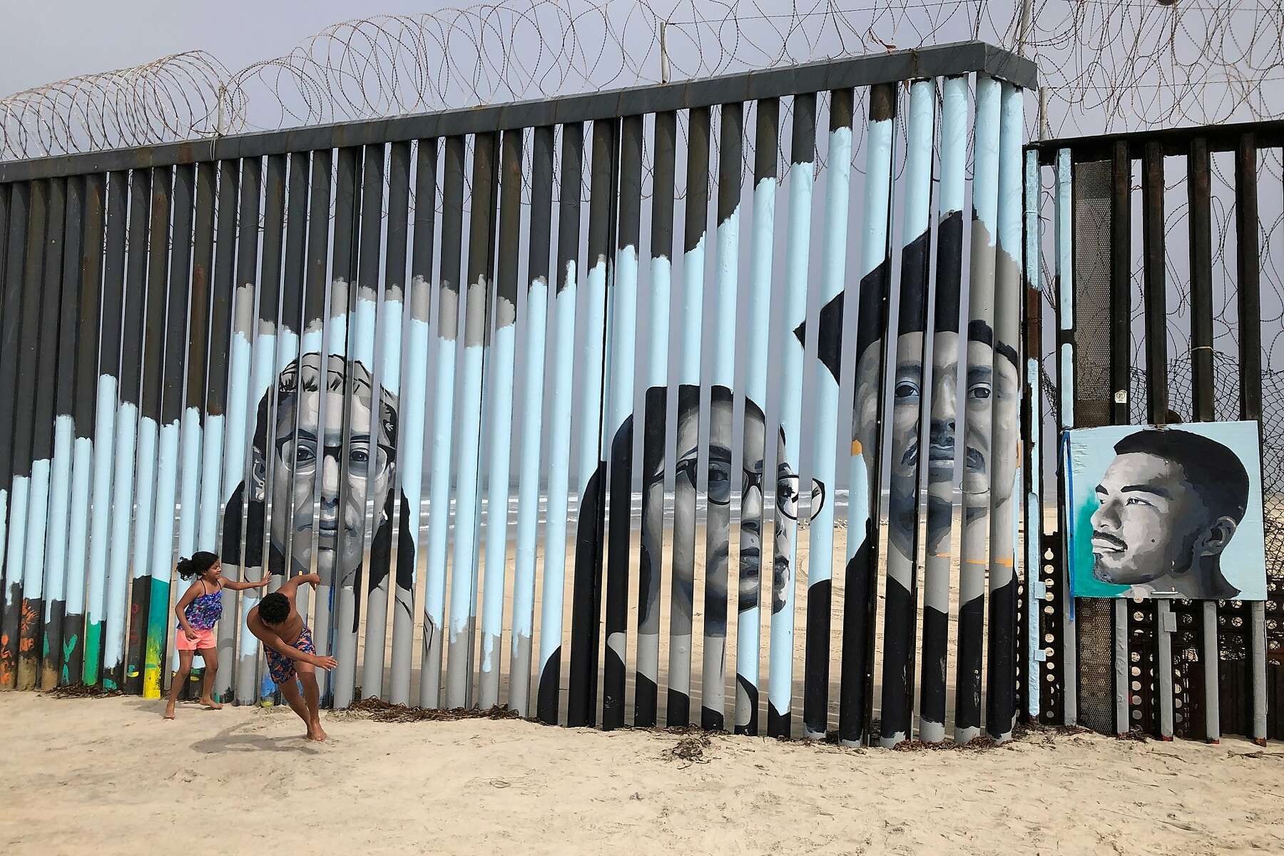 Border wall mural in Tijuana tells stories of deported