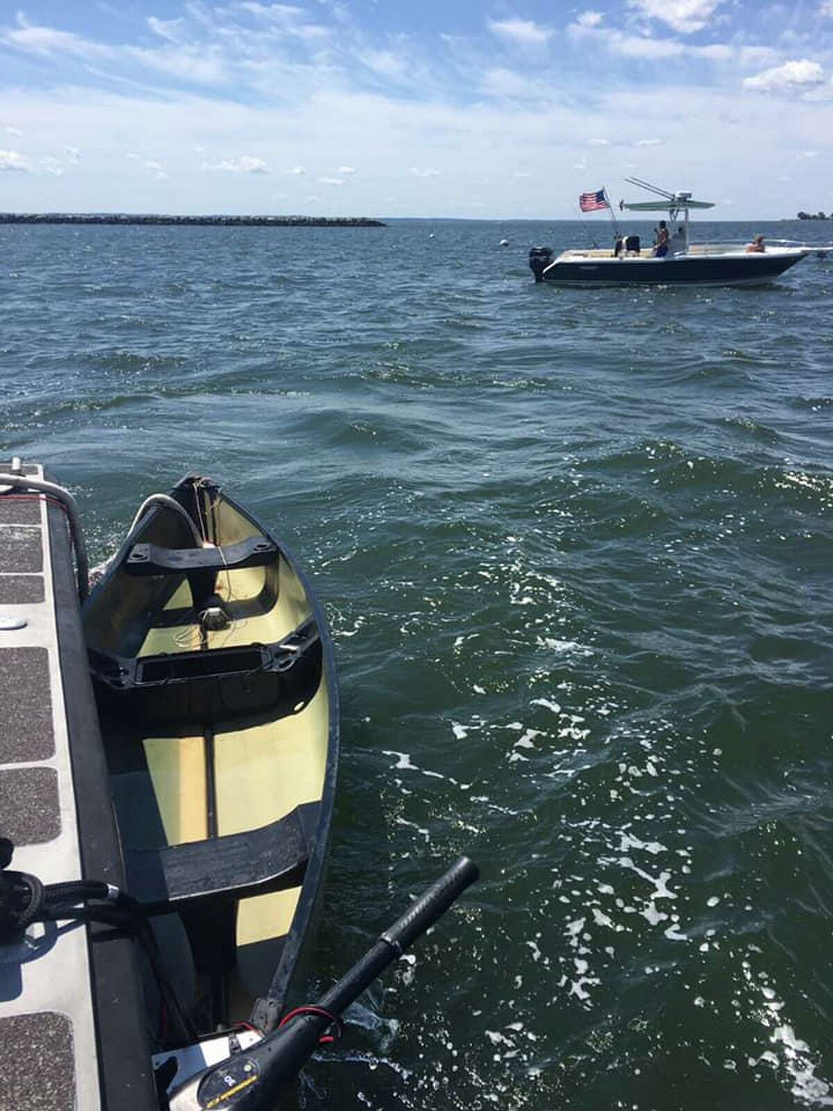 The U.S. Coast Guard Sector Long Island Sound is looking for the owner of a 10-foot canoe that was found capsized and anchored in the waters off Stamford on Saturday.
