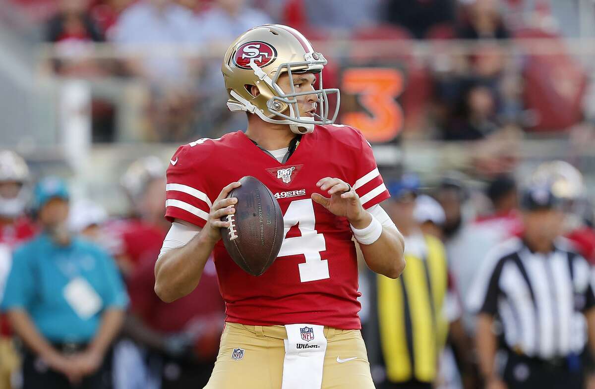 San Francisco 49ers quarterback Nick Mullens (4) looks for a receiver during the first half of the team's NFL preseason football game against the Dallas Cowboys in Santa Clara, Calif., Saturday, Aug. 10, 2019. (AP Photo/Josie Lepe)