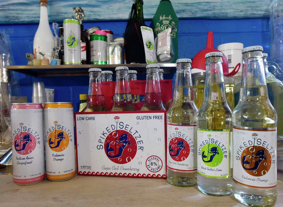Boathouse Beverage tinkers with new drink formulations in the company's Norwalk, Conn. office Thursday, October 6, 2016. The company celebrated their Spiked Seltzer sale to Anheuser Busch-InBev in September. The start-up created the category of "hard seltzer" with their Spiked Seltzer brand.