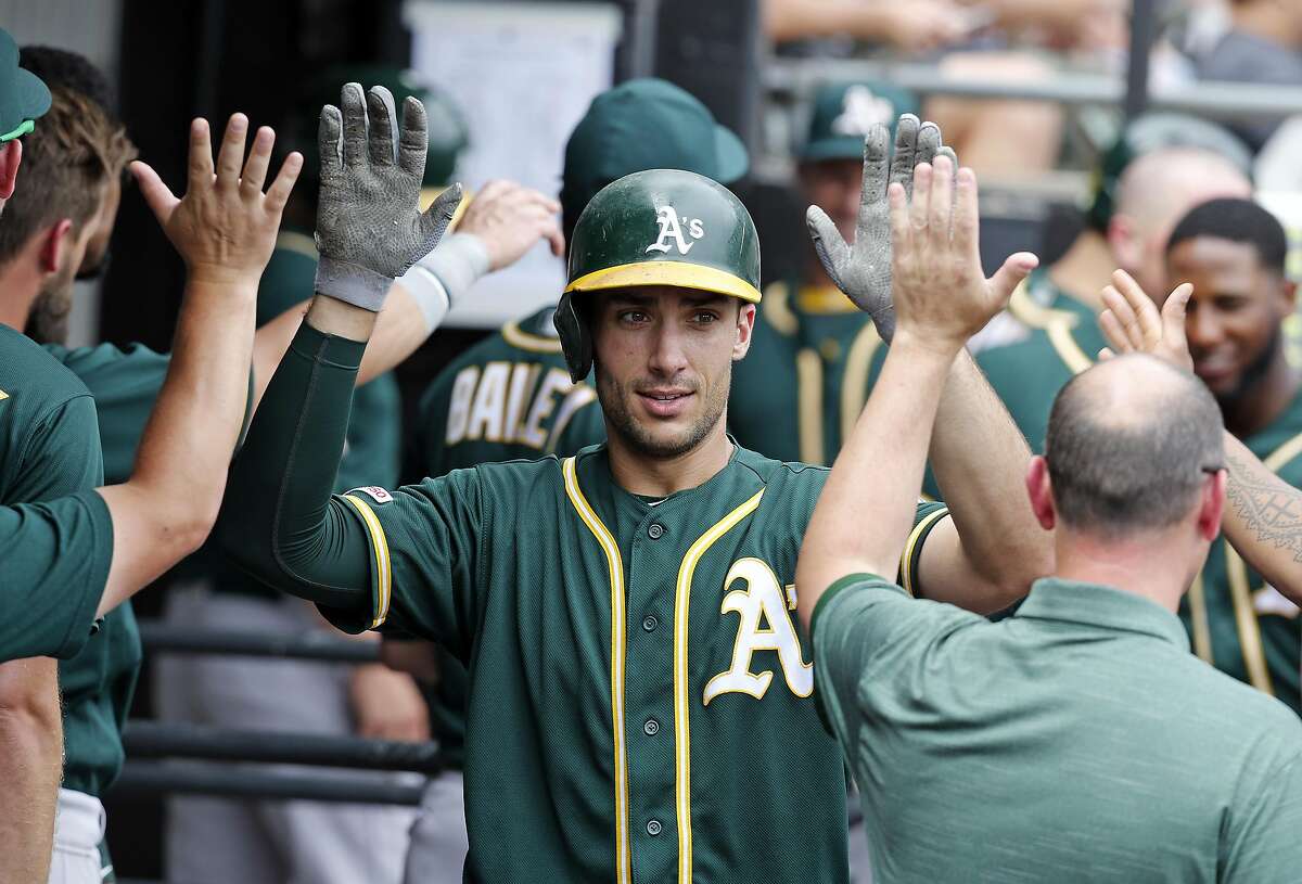 CHICAGO, ILLINOIS - AUGUST 11: Matt Olson #28 of the Oakland Athletics celebrates following his two run home run against the Chicago White Sox during the fourth inning of a game at Guaranteed Rate Field on August 11, 2019 in Chicago, Illinois. (Photo by Nuccio DiNuzzo/Getty Images)