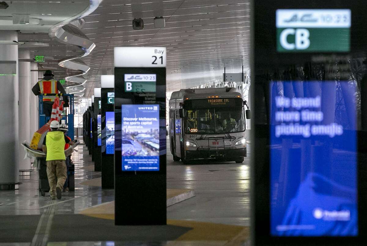 An Alameda-Contra Costa Transit (AC Transit) bus pulls into the reopened Salesforce Transit Center on the first day service returns to the reopened transit center Sunday, Aug. 11, 2019, in San Francisco, Calif.