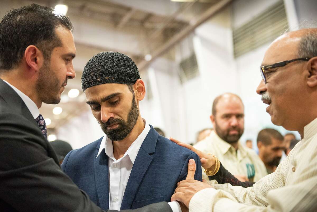 Hamid Hayat, center, receives greetings from community members, including Basim Elkarra, at left, of the Council on American Islamic Relations. The Sacramento Valley office of the Council on American-Islamic Relations (CAIR-SV) joined Hamid Hayat, a Lodi resident whose 2006 terrorism-related conviction and sentence were recently overturned, his family and his legal team for a press conference during Eid ul-Adha celebrations.