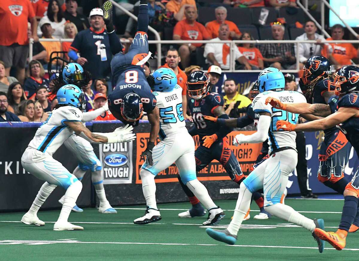 Albany Empire's Terence Moore (8) is up-ended while recovering a onside kick against the Philadelphia Souls during the ArenaBowl XXXII football game at the Times Union Center, Sunday, Aug. 11, 2019, in Albany, N.Y. (Hans Pennink / Special to the Times Union)
