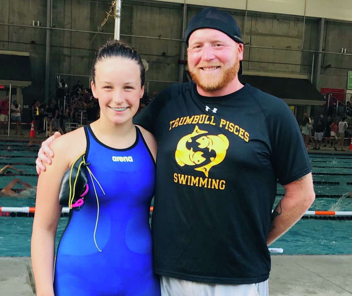 Kristen Racicot with Pisces head coach Bill Strickland at CT Age Group Championships.