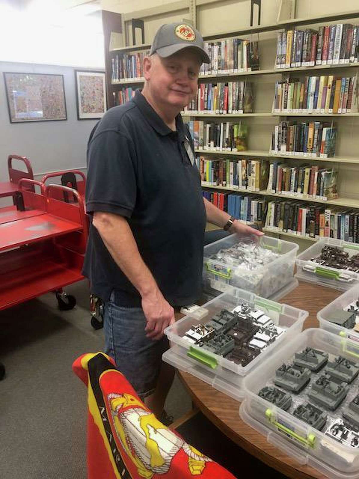 Shelton resident George Neubauer will have an exhibit of his handmade war memorabilia at the Plumb Memorial Library this month.
