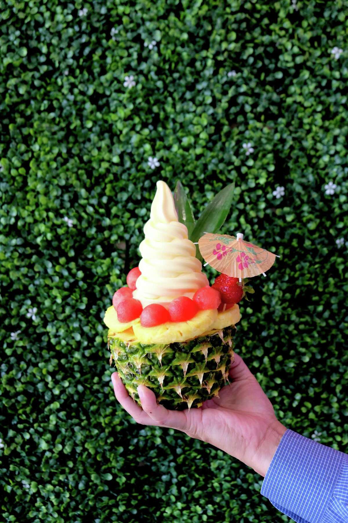 Dole Pineapple Express (Dole Whip) served in a pineapple bowl at Twisted Love in Asiatown.