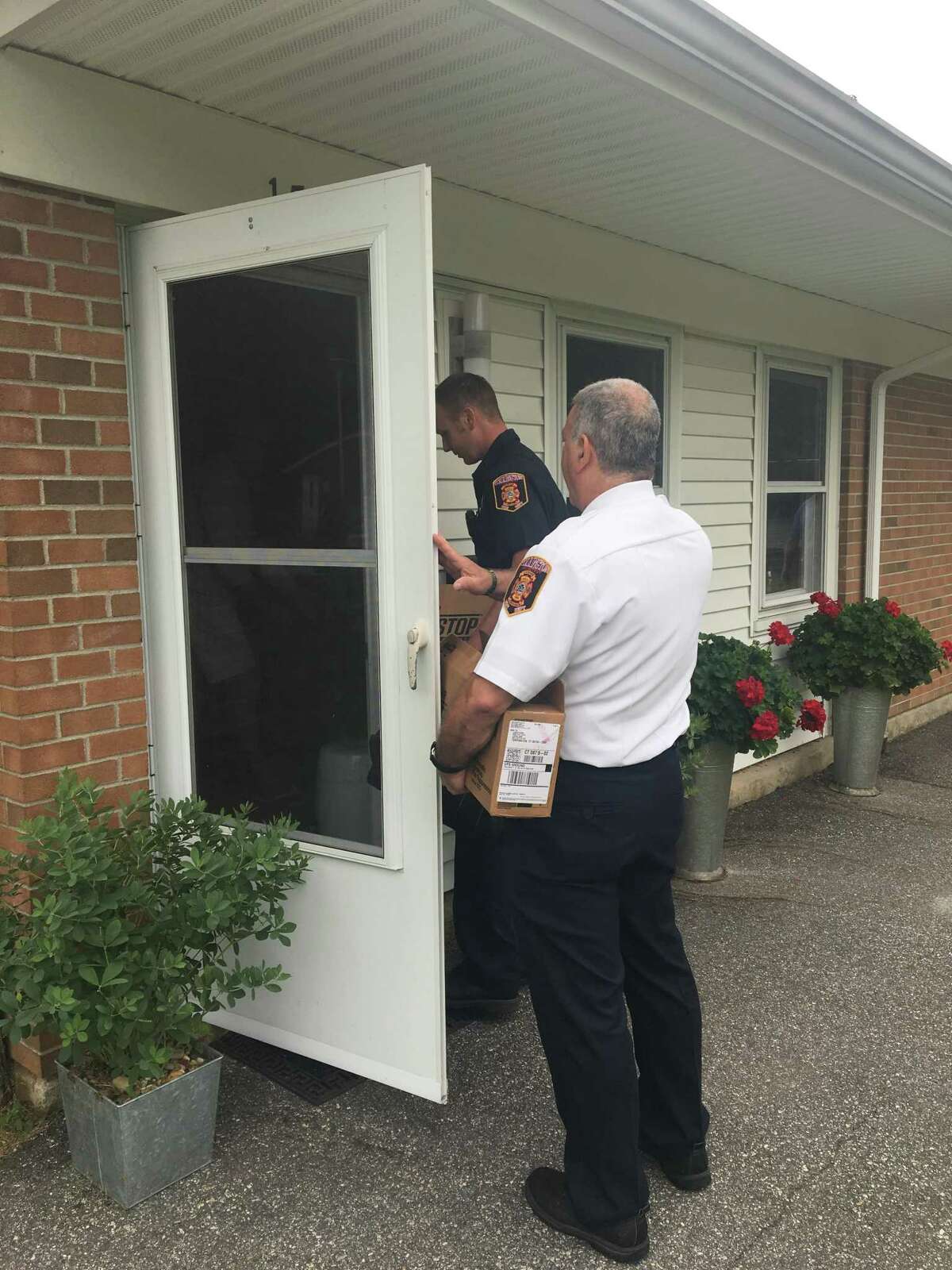On August 7, the Torrington Fire Marshal’s Office, members of the Torrington Fire Department, and the Torrington Housing Authority installed stove top extinguishers in each unit (56) including the Community Room at Laurel Acres.
