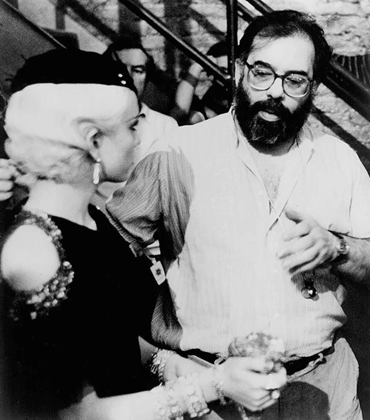 Actor Diane Lane and director Francis Ford Coppola discuss a scene during filming of "The Cotton Club."
