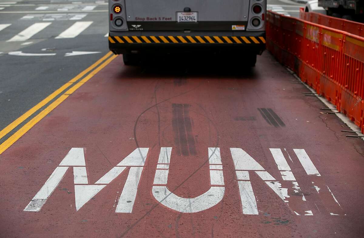 A Muni bus in the red lane transit-only lane on Haight Street near Market Street as seen Monday, July 29, 2019, in San Francisco, Calif.