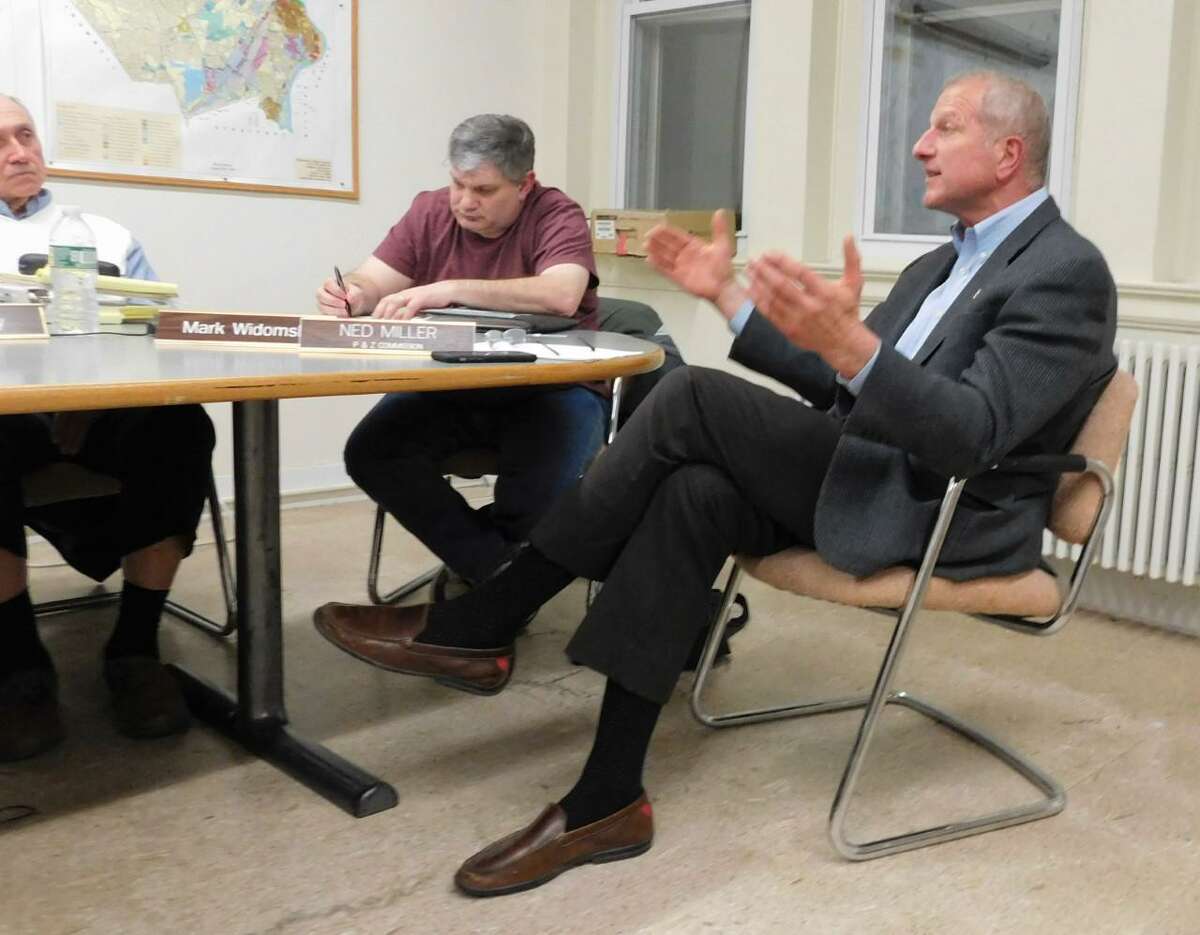 Mayor Mark Lauretti, right, criticizes the P&Z over recent actions during the March 19 commission meeting on Planned Development District regulations. Member Mark Widomski is on the left.
