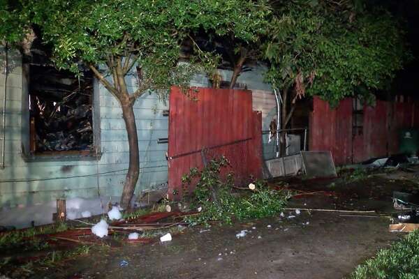 Neighbor Uses Garden Hose To Protect His Home As Fire Rips Through North Houston House Houstonchronicle Com