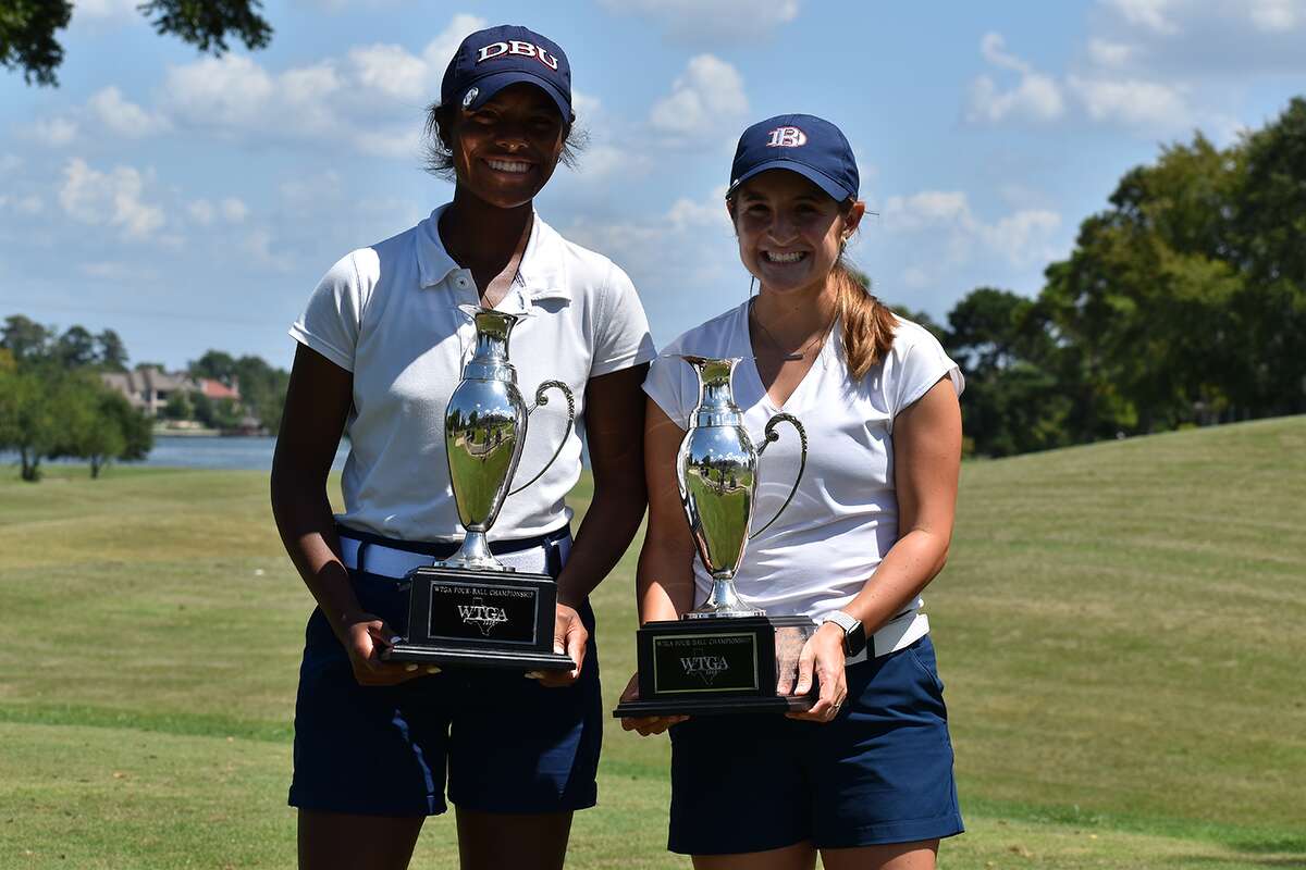Midland High grad Faith DeLaGarza, right, and Amari Smith hold their trophies after they teamed to win the Women's Four-Ball Championship, Tuesday at Bentwater Country Club in Montgomery.