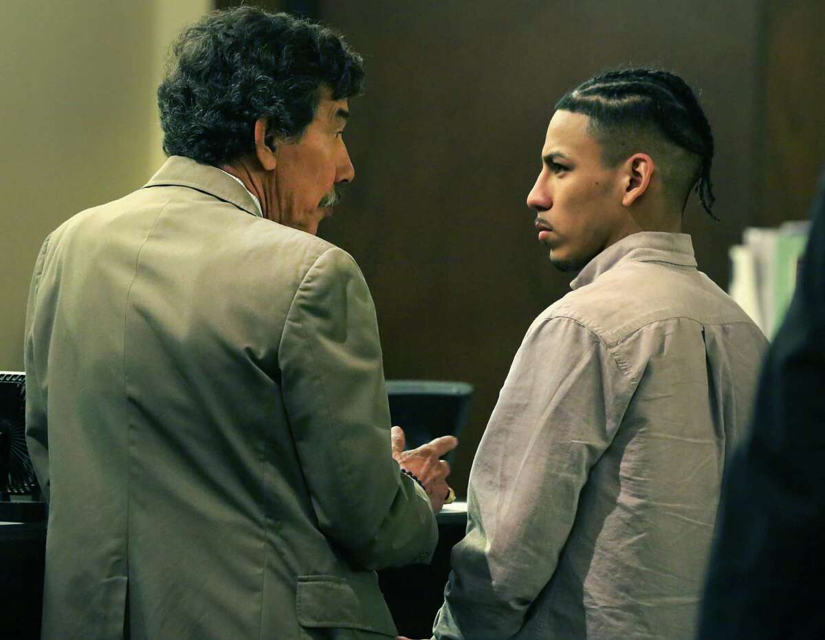 Ernesto Esquivel-Garcia, right, listens to his lawyer George Shaffer after he was found guilty of murder for killing Jared Vargas, 20, last year.