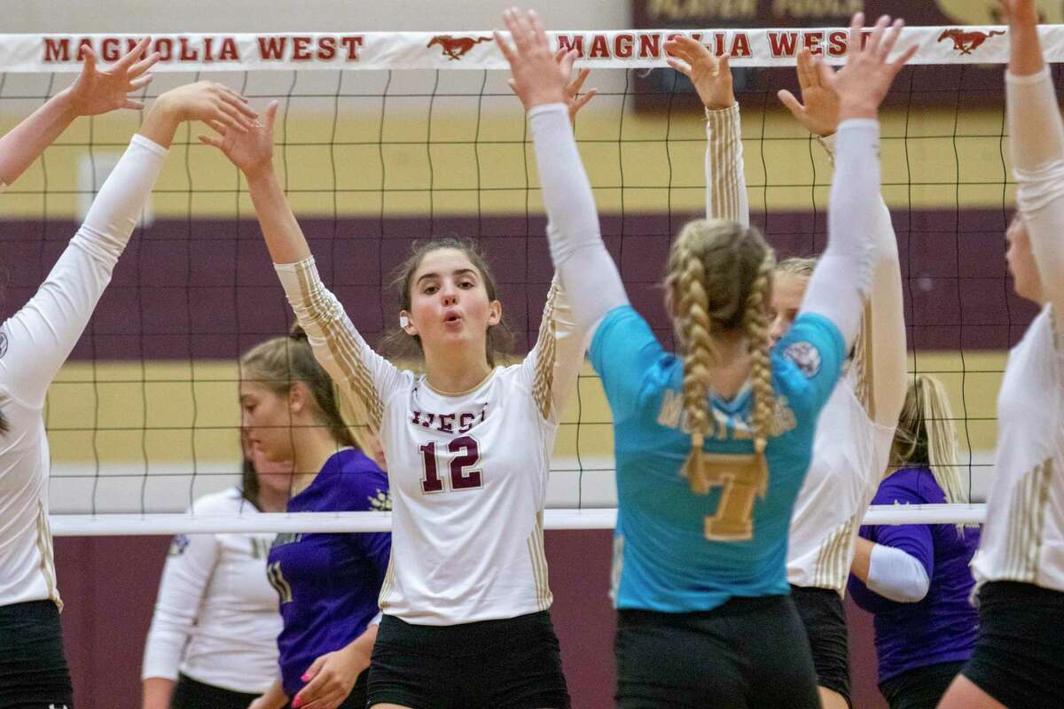 Magnolia West celebrates after scoring during a non-district volleyball match Tuesday at Magnolia West High School in Magnolia.