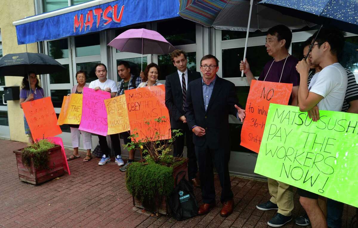 Westport RTM member Sal Liccione and State Senator Will Haskell join protestors and labor leaders to protest the firing two Matsu Sushi staff members during a picket of the restaurant.