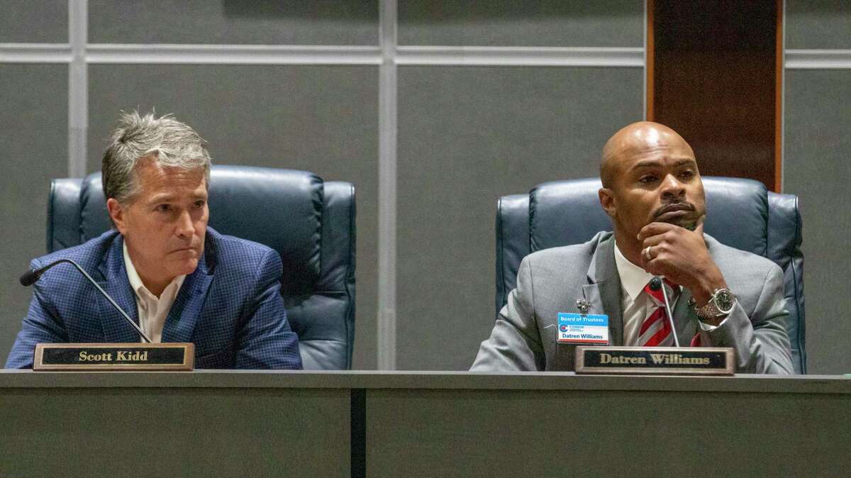 CISD board member Scott Kidd and board president Datren Williams listen to public comments during a CISD Board of Trustees public budget hearing Tuesday, August 6, 2019 at CISD administration building in Conroe.