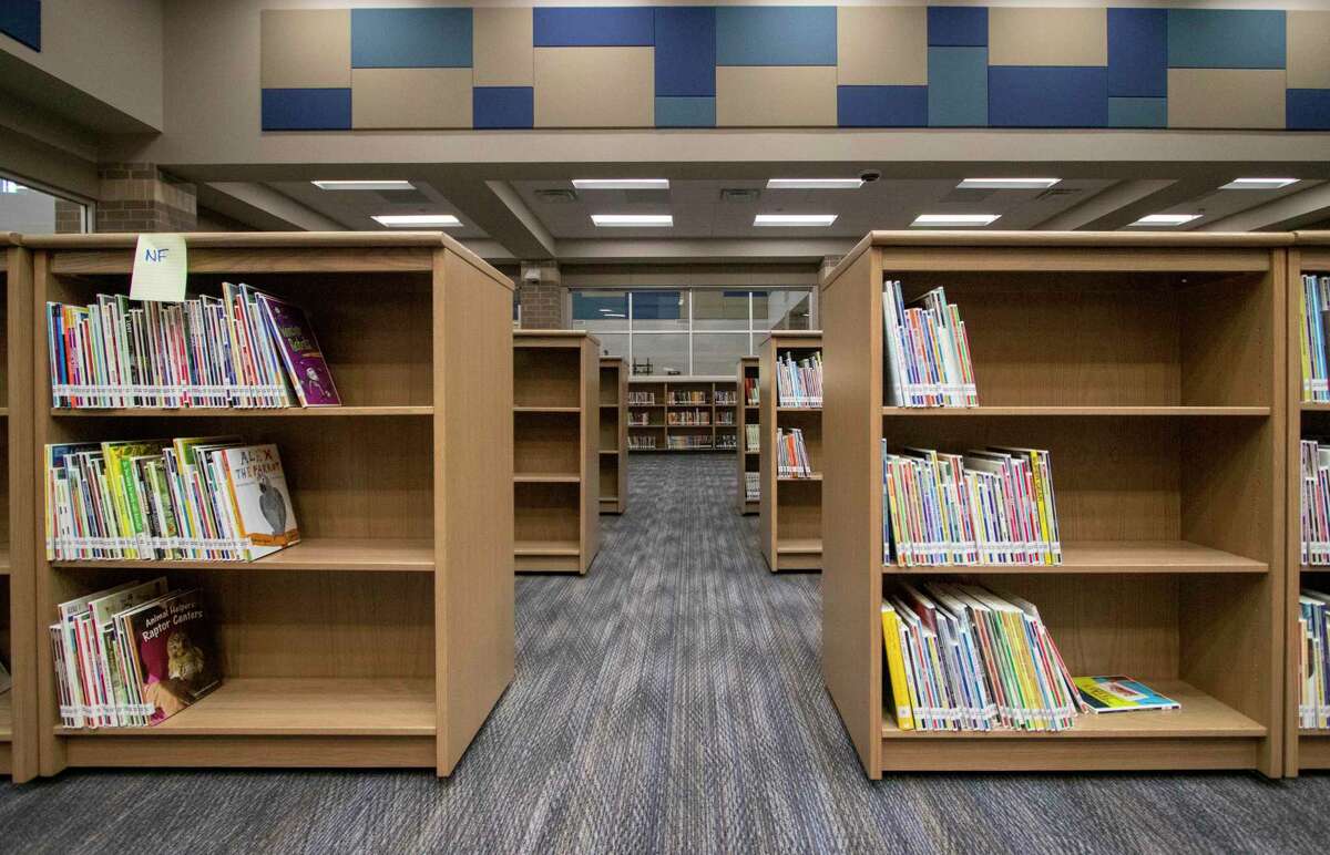 A new library is nearly unpacked in 2019 at Suchma Elementary. Conroe ISD schools will remove from library shelves some books and materials that have come under fire for LGBTQ themes and sexual content, but will allow students to check them out with their parent’s permission, trustees decided this week.