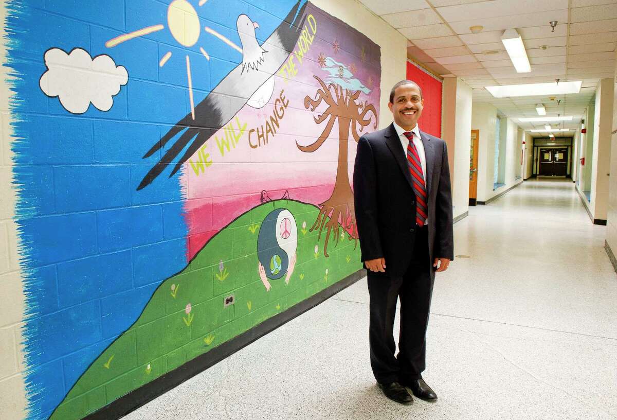Northeast Elementary School Principal Hubert Gordon poses for a photo in the school in Stamford, Conn., on Thursday, August 14, 2014.