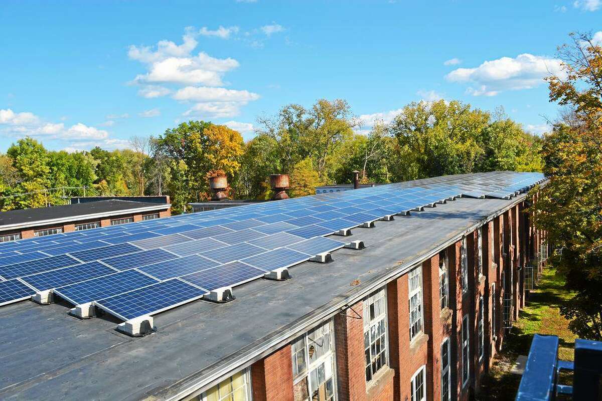 The roof of Middletown’s R.M. Keating Historical Enterprise Park on Johnson Street (formerly Remington Rand) is outfitted with solar panels from Greenskies Renewable Energy.
