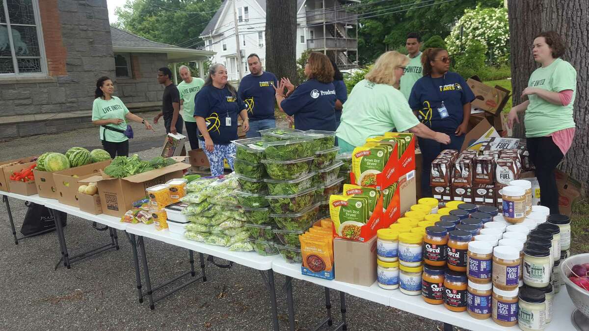 Volunteers from Prudential, CT Basement Systems, and Good Shepherd Episcopal Church recently joined the Valley United Way to host an outdoor food pantry.