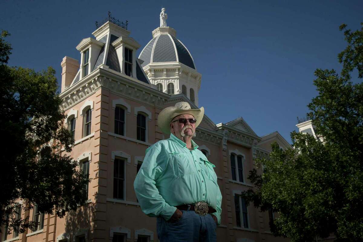Frank "Buddy" Knight, a Presidio County commissioner, made the motion to pass a resolution declaring the county a Second Amendment sanctuary. He posed for a portrait near the county courthouse on Friday, July 26, 2019, in Marfa.