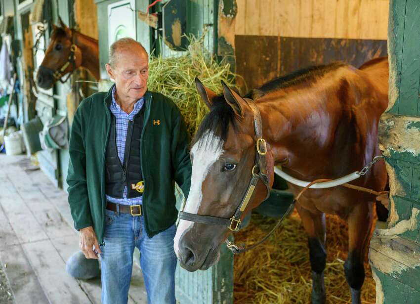 Trainer Barclay Tagg hangs out with 2 year old Tiz the Law owned by Sakatoga Stables Wednesday Aug. 14, 2019 at the Saratoga Race Course in Saratoga Springs, N.Y. Photo by The Jockey Club