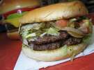 A double-meat burger can be ordered with white American cheese and a mix of grilled onions and jalapeños at Danny Boy's Hamburgers.