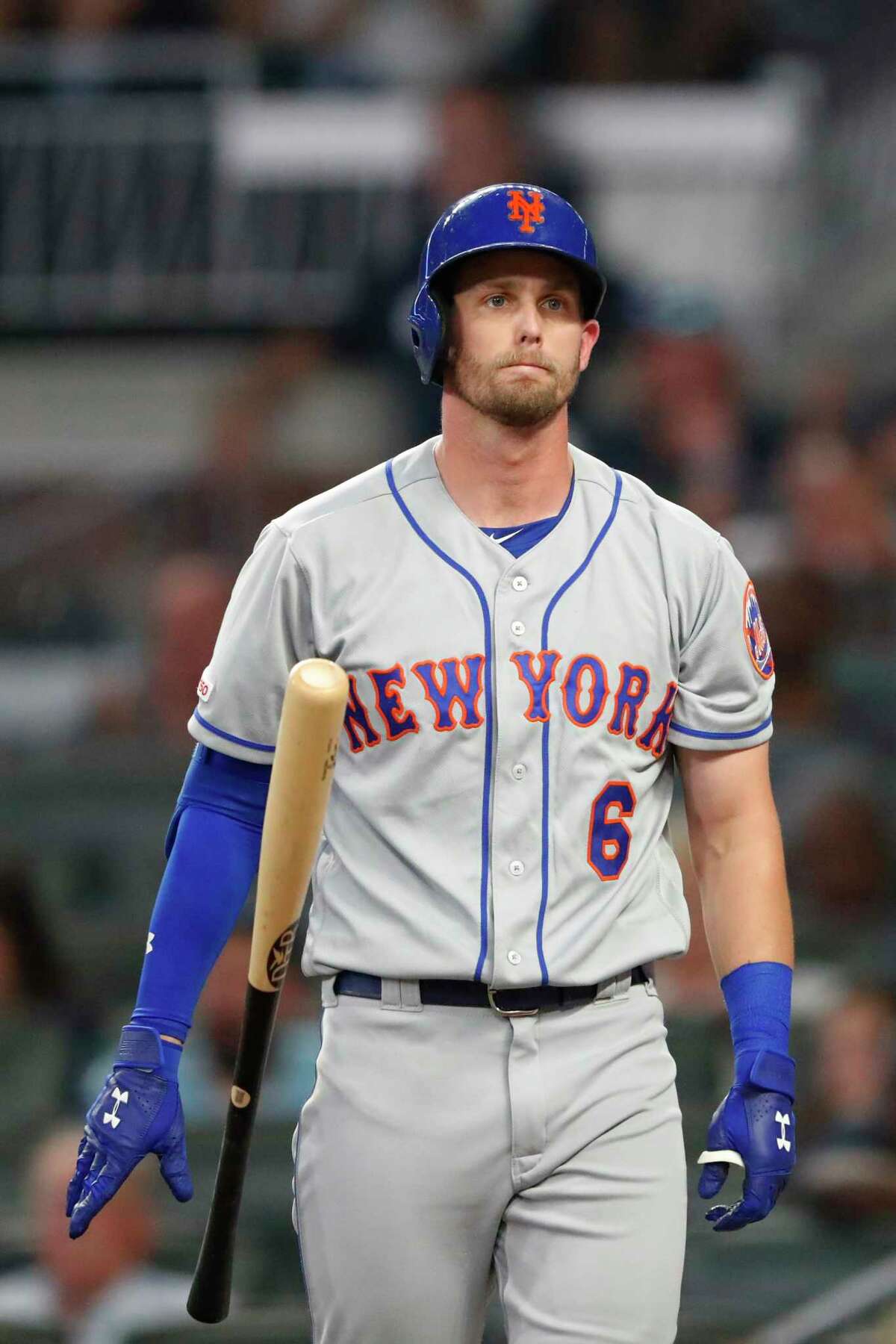 New York Mets' Jeff McNeil reacts after striking out to end the top of the fourth inning of the team's baseball game against the Atlanta Braves on Tuesday, Aug. 13, 2019, in Atlanta. The Braves won 5-3. (AP Photo/John Bazemore)