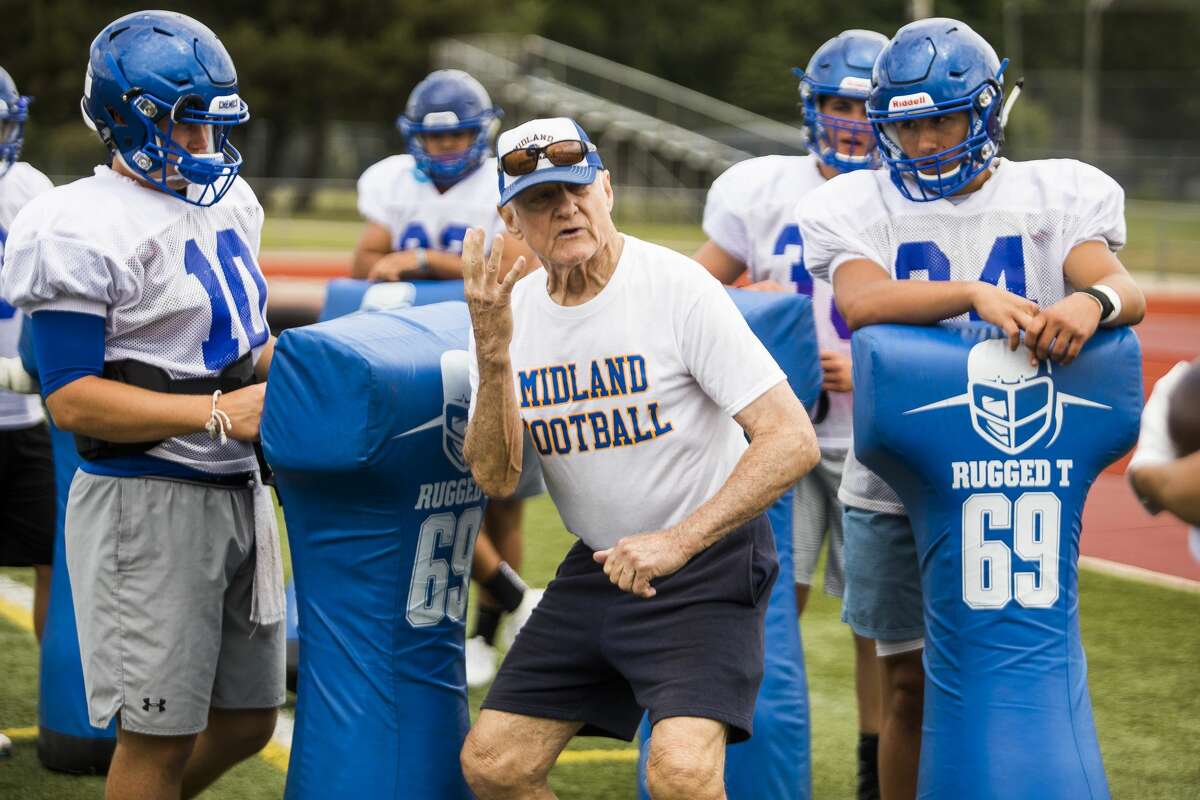Former Midland High football coach Gary Jozwiak instructs players during practice on Thursday, Aug. 15, 2019 at Midland Community Stadium. (Katy Kildee/kkildee@mdn.net)