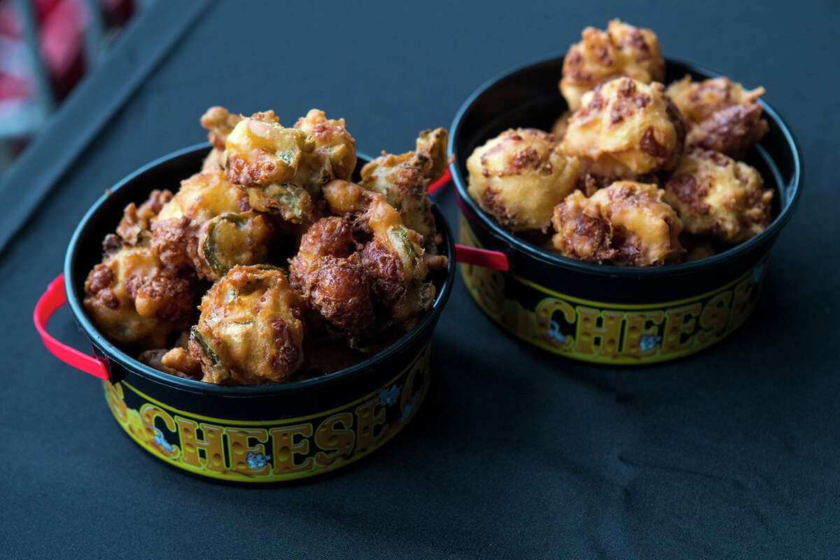 Bucket of Fried Cheese Curds (Sections 103, 123) Cheese curds - original or Blue Moon jalapeno beer battered - are shown during the What's New at NRG Stadium event on Thursday, Aug. 15, 2019 in Houston .
