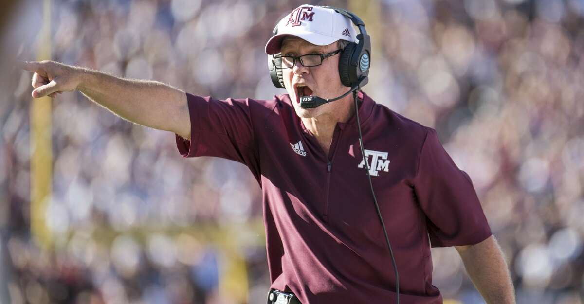 FILE - In this Oct. 13, 2018, file photo, Texas A&M head coach Jimbo Fisher directs with players during the first half of an NCAA college football game Saturday,, in Columbia, S.C. First-year coach Jimbo Fisher and the Aggies are trying to bounce back from a two-game losing skid when they host Ole Miss on Saturday. (AP Photo/Sean Rayford, File)