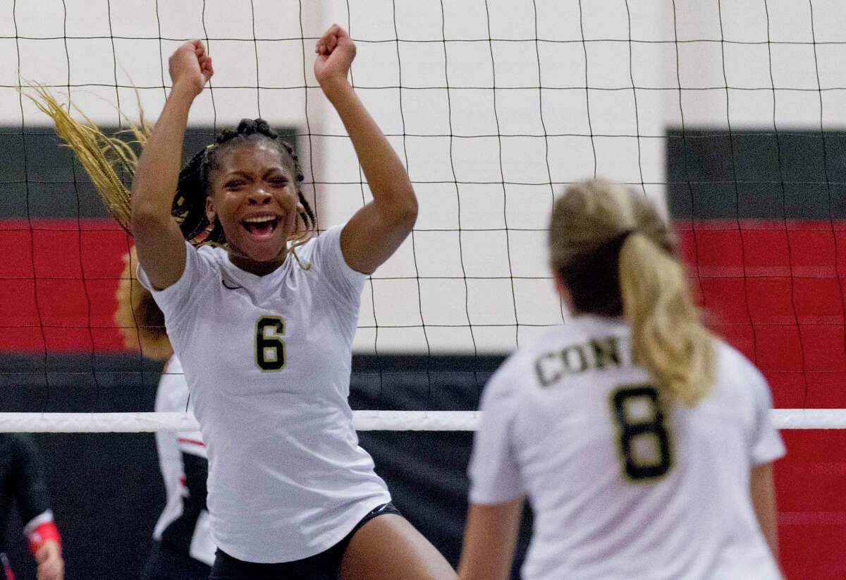Conroe middle blocker T’lisha Kennedy (6) reacts after scoring a point in the first set of a match during the Spring ISD Varsity Volleyball Classic at Westfield High School, Thursday, Aug. 15, 2019, in Houston.