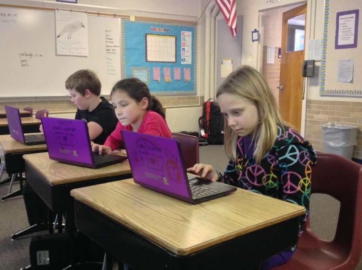 CLASSROOM TOOLS: Fifth grade students at Frankfort Elementary School work on their new Chromebook computers during class. The devices will be an extremely useful tool for teachers and students alike. (Courtesy photo)