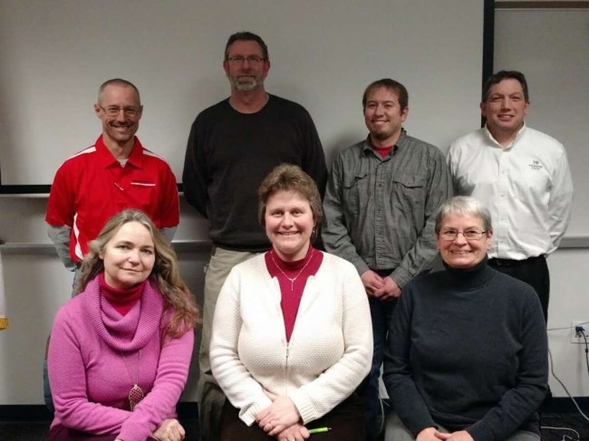 SCHOOL BOARD: Pictured is the Benzie Central School Board (front row, from left) is Secretary Lori Cota, President Lorraine Nordbeck, and trustee Kathy Ross. Back row, from left, is trustee Scott Gray, Treasurer Doug Taylor, trustee Brian Childs and Vice-President Tom Stapleton. (Courtesy photo)