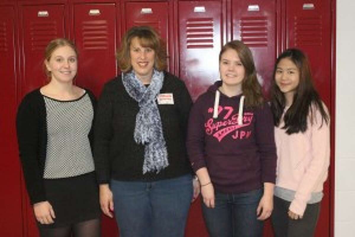 INTERNATIONAL STUDENTS: Benzie Central High School international students Julie from Denmark, coordinator Ann Burkett, Katrina from Finland and Sky from Thailand.